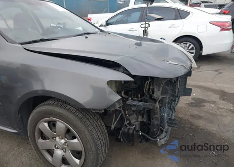 2009 Kia Optima Lx z USA, uszkodzony, nr VIN KNAGE228X95333611